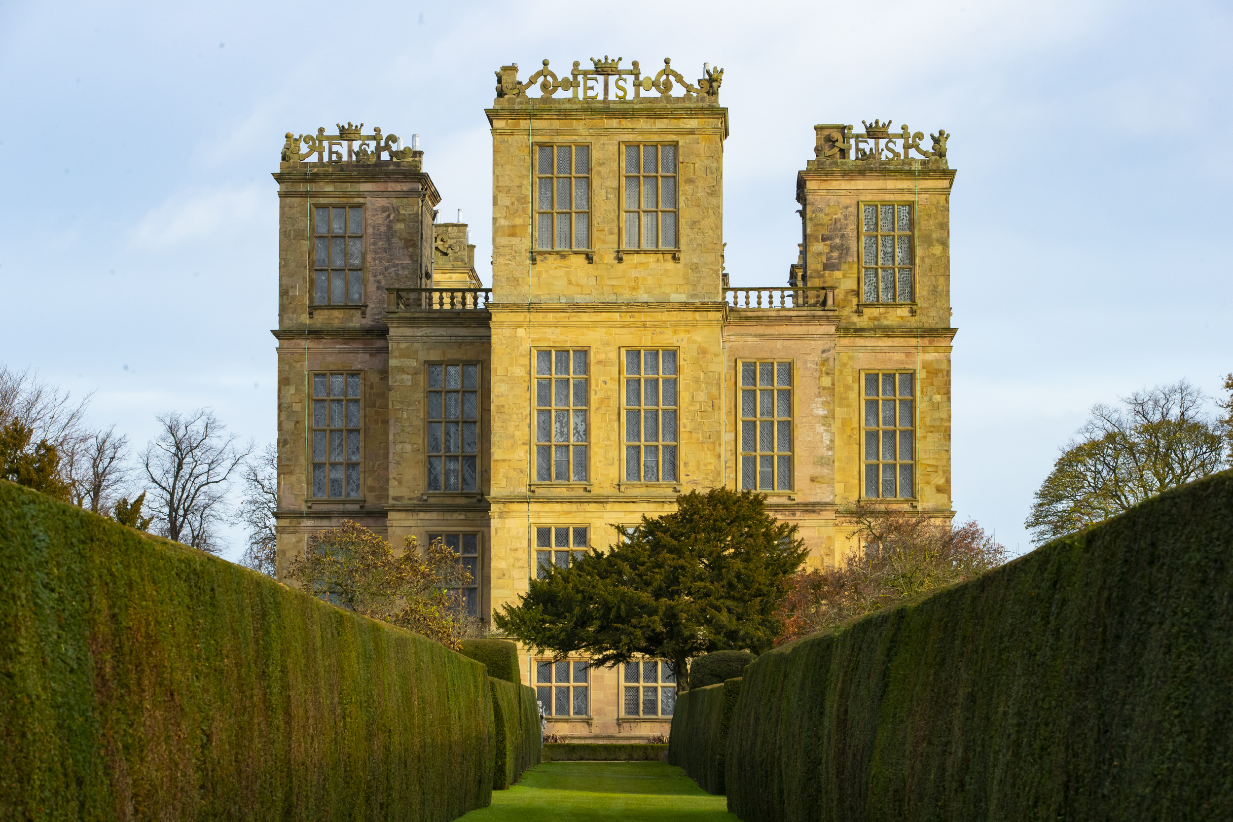 View along the Yew Alley towards the hall at Hardwick, Derbyshire